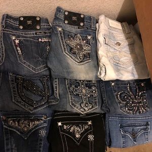 Misc pairs of size 27 Miss Me’s (ask for pricing)